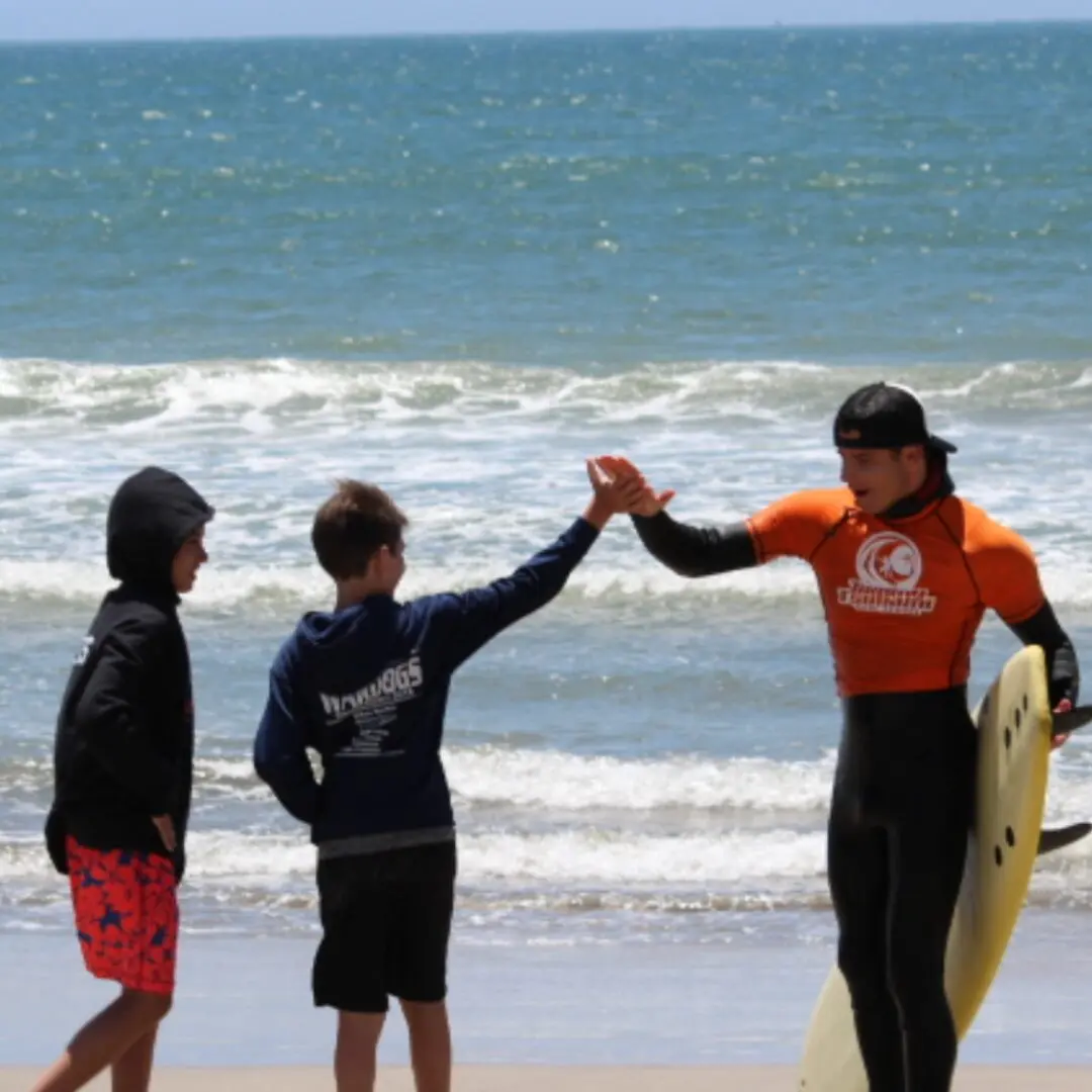 high five after surf lesson